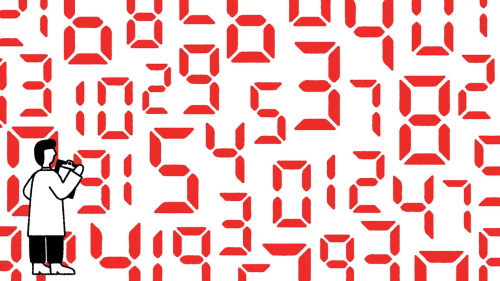A person standing before a wall of red seven-segment digital numbers, holding a camera